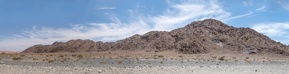 range of conglomeratic sediments hills near Serisem canyon, Naukluft desert,  Namibia