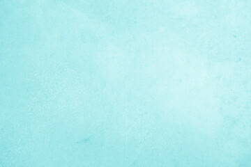 Pastel blue and white concrete stone texture for background in summer wallpaper. Cement and sand wall of tone vintage. Decorative abstract wall of light cyan color painted, Beautiful mint green decor.