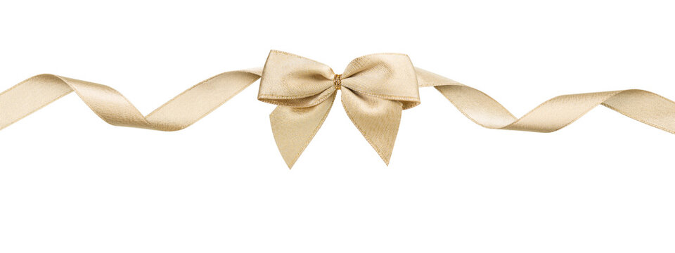 Golden bow with long curled ribbon, isolated on transparent background. PNG image.