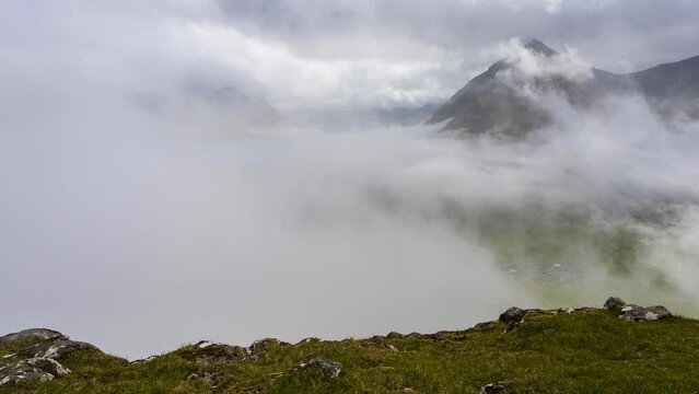 Time lapse of  spectacular mountains and fjords near over clouds in Faroe Islands, Denmark.