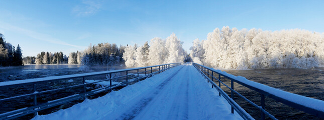 Country road landscape in a cold and frosty winter day - 716403603