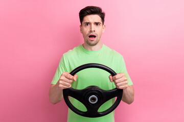 Photo of angry young stressed guy driving and watching traffic crash confused because he has no...