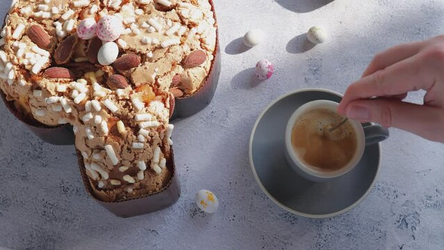 the Colomba Pasquale, a traditional Italian Easter cake shaped like a pigeon. stir the coffee. This Easter bread, known as Colombia, is studded with nuts.