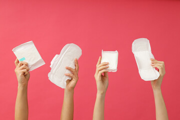 Feminine, intimate hygiene products in the hands of a woman.
