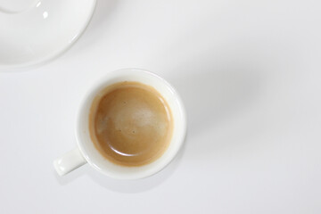 Espresso Coffee with Fresh Crema Foam on White Background. Coffee Break.