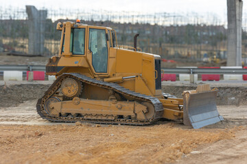 Excavator on a road construction site