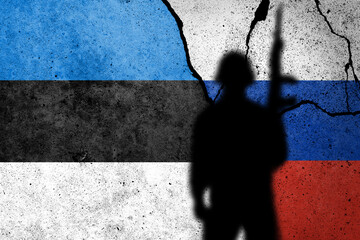 Flag of Estonia and Russia painted on a concrete wall.