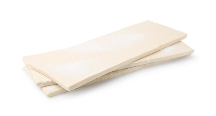 Raw puff pastry dough isolated on white