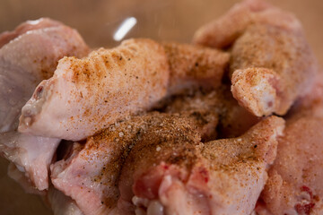 Raw chicken wings in spices. Cooking homemade food. Healthy diet food