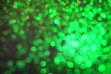 St. Patrick day. Green background with blurred lights, bokeh effect
