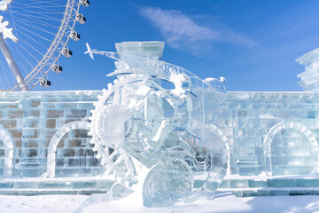 Harbin International Ice and Snow Sculpture Festival is an annual winter festival that takes place in Harbin, China. It is the world largest ice and snow festival. - obrazy, fototapety, plakaty