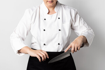 chef holding knife in white background isolated
