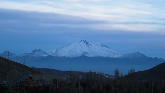 Beautiful clouds move quickly over Mount Erciyes