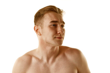 Portrait of young redhead guy standing shirtless isolated over white background. Spotless, clear smooth skin. Concept of male beauty, skin care, cosmetology and cosmetics, health