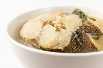 Cod soup on a white background