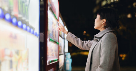 Vending machine, woman and phone payment at night, automatic digital purchase or choice of food in...