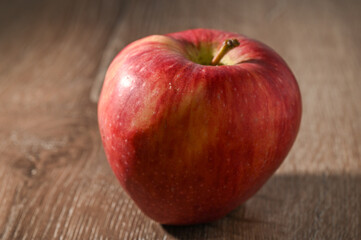 red apples on a wooden table 1