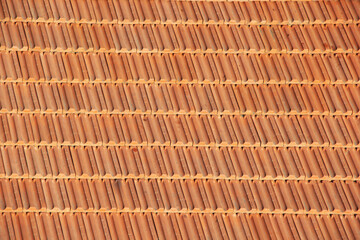 even rows of clay tiles on an old house. selective focus . High quality photo