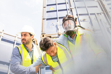 Team male rescue workers PPE uniforms wearing gas mask protect against accidental leaks toxic fumes dangerous gases pungent odor keep workers unconscious safe from dangerous toxins inside container.