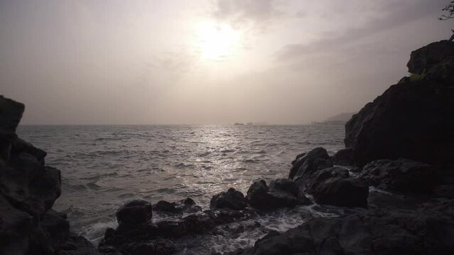 Beach with rocks at sunset in Cameroon, Africa