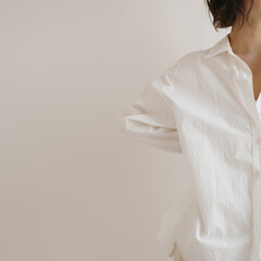 Young beautiful woman in white shirt. Minimal aesthetic beauty, fashion concept for magazine, blog,...