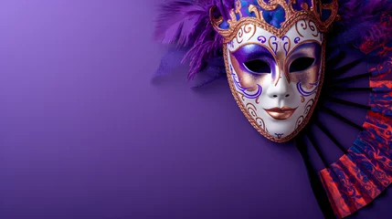 Tuinposter purple and yellow venetian or masquerade mask, feather, confetti and hand fan. over on the purple background. free space for text advertising. © Lucianastudio