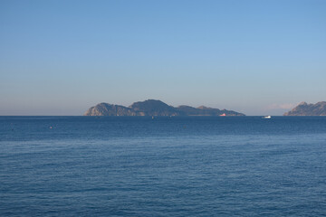 Fototapeta na wymiar The Cies Islands in the Ria de Vigo seen from Vao beach