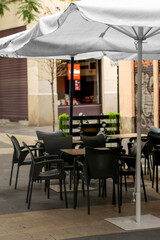 Sunny Retreat: Day of Pleasure at the Pedestrian Street Bar with Umbrellas