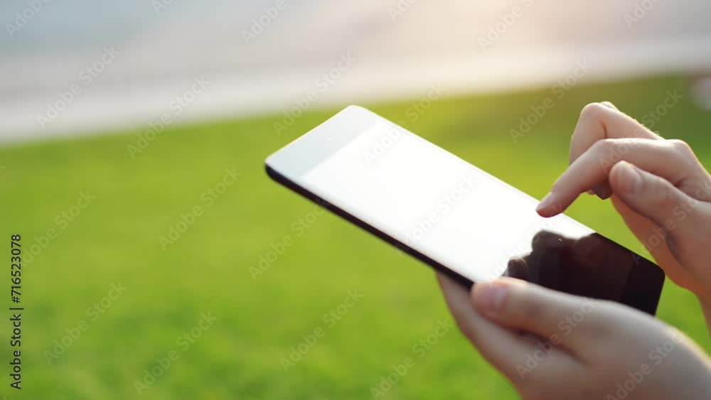 Poster hands, phone and typing on screen in outdoors, internet connection and scrolling on social media. cl