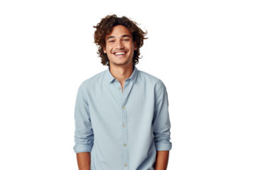 Charming young man with curly hair, wearing a light blue shirt, radiates confidence and friendliness against a transparent background