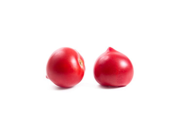 Two pink tomatoes isolated on white background.