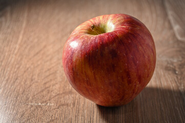 red apples on a wooden table 9