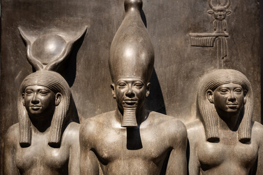 Cairo, Egypt - November 14 2023: Triad of Menkaure between Hathor and the Theban god displayed in the Egyptian Museum of Cairo near the Tahrir square.