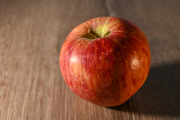 red apples on a wooden table 12