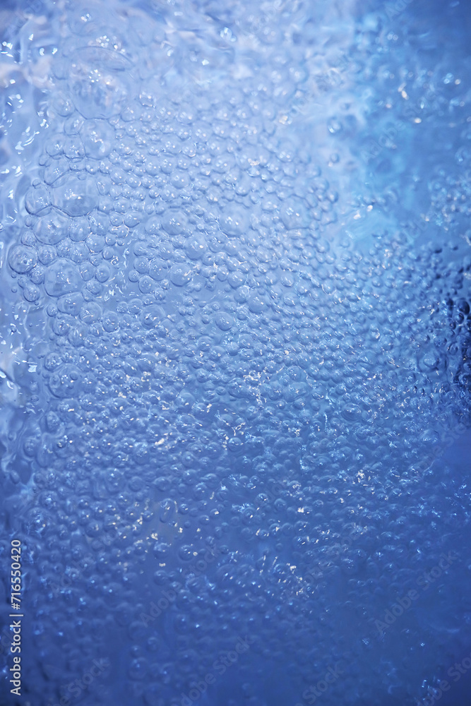 Wall mural blue water texture. bubbles and bubbling water.