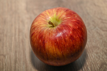 red apples on a wooden table 15