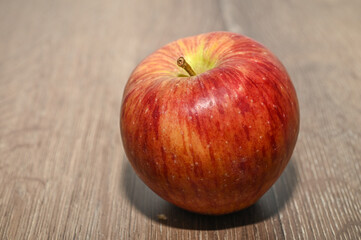 red apples on a wooden table 16