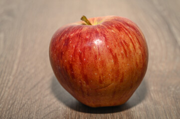 red apples on a wooden table 17