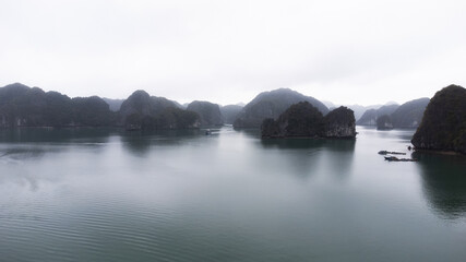 aerial drone view of foggy halong bay, vietnam