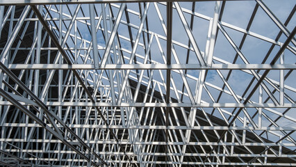 light steel roof frame that has been installed on a construction works building