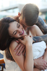 Young tattooed stylish couple in love