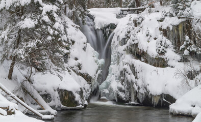 beautiful winter Szklarka waterfall in the Karkonosze Mountains in Lower Silesia, Poland