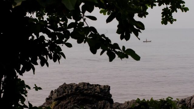 Beach with rocks at sunset in Cameroon, Africa