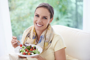 Woman, eating salad and food for diet, vegetables and lunch with happiness in portrait. Nutrition, wellness and healthy vegan meal for cholesterol with smile, detox and snack for dinner at home