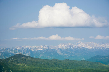 Amazing mountains panorama from "5 Fingers" viewing platform in the shape of a hand with five fingers on Mount Krippenstein in the Dachstein Mountains of Upper Austria, Salzkammergut region, Austria.