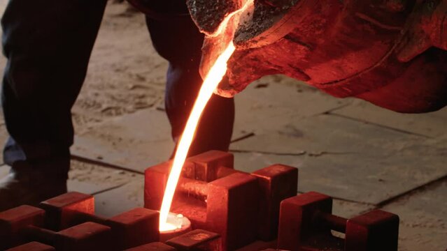 4K Closeup Molten Metal Pour into mold