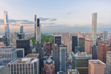 big skyline New York City panorama after sunset at night with a view of central park. - obrazy, fototapety, plakaty