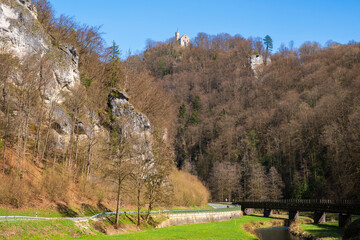 In the Wiesent Valley in Franconian Switzerland/Germany on a sunny spring day with Gößweinstein Castle in the background