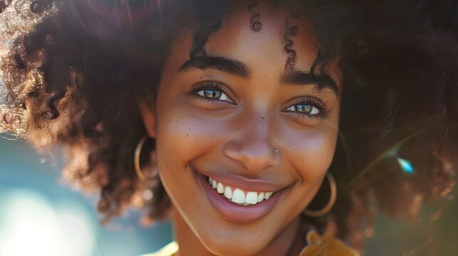 detailed close-up portrait of an african american woman beautiful curly hair and radiant smile