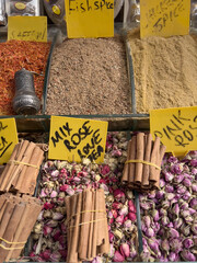 herbal tea and spices on bazaar market stall with labels